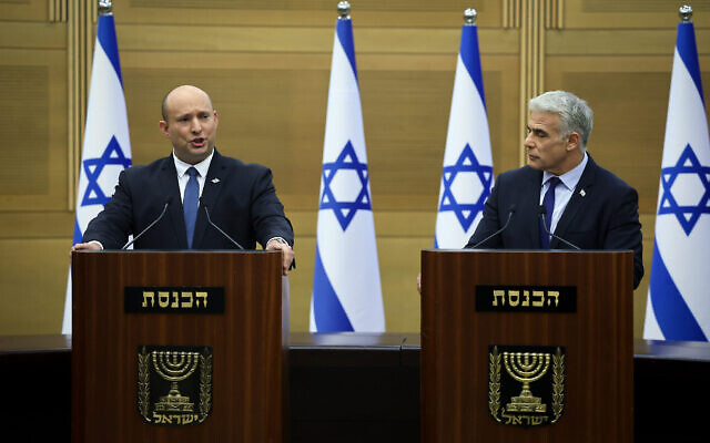 Israeli prime minister Naftali Bennett and Foreign Minister Yair Lapid hold a joint press conference at the Israeli parliament in Jerusalem on June 20, 2022. Photo: Yonatan Sindel/FLASH90