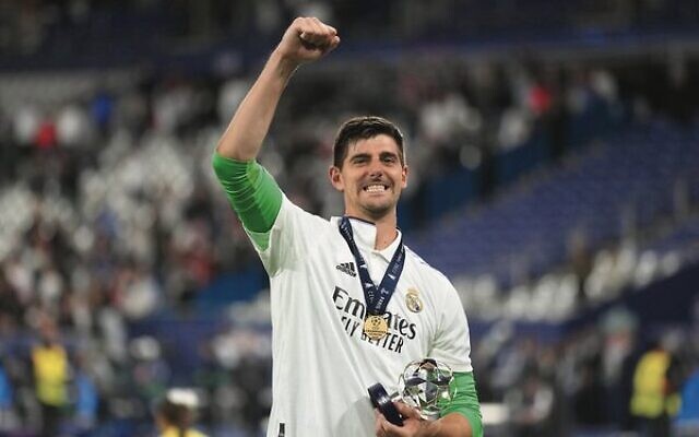 Real Madrid's goalkeeper Thibaut Courtois celebrates his team's Champions League final win. Photo: AP Photo/Kirsty Wigglesworth