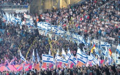 Israeli flags flying high at the 2017 Maccabiah Games opening ceremony at Teddy Stadium in Jerusalem. Photo: Julie Kerbel.