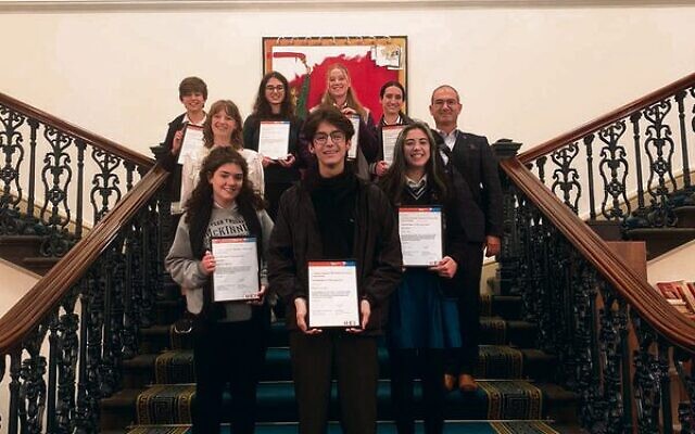 The J-Voice Committee receiving their certificates at the recent ceremony.