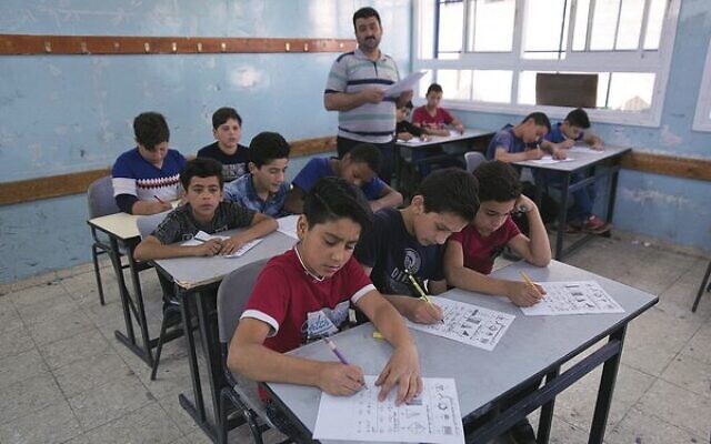 Illustrative: Palestinian schoolchildren at the UNRWA Hebron Boys School in 2019. Photo: AP Photo/Nasser Nasser
