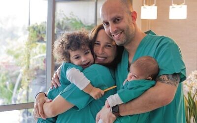 Dr Eyal Mor with his wife, Dr Danielle Hadar-Mor, and their two children.