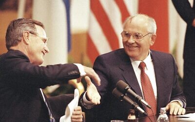 In this Sept. 9, 1990 file photo US President George H. W. Bush shakes hands with Soviet President Mikhail Gorbachev at the conclusion of their joint news conference ending the one day summit in Helsinki, Finland Photo: AP Photo/Liu Heung Shin, file