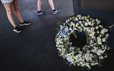 A flower wreath with the Israeli flag is seen at the memorial site 'Erinnerungsort Olympia-Attentat' (Place of remembrance of the Olympic attack).