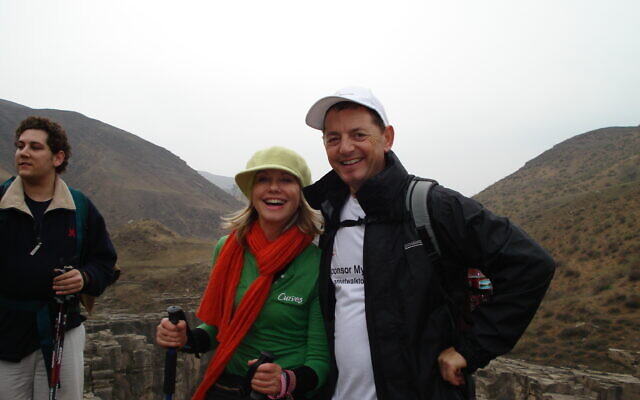 Professor Jonathan Cebon and Olivia Newton John during their 228 km walk of the Great Wall of China in 2008 to raise awareness for cancer