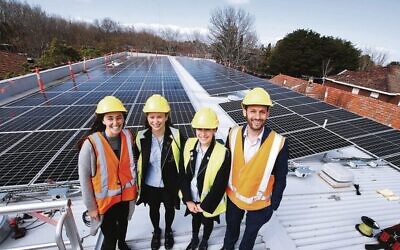 The King David School goes solar. New solar panels on the roof of the Orrong Road campus. From left: Anna Fink, Ella Freeman, Freya Boltman, Marc Light. Photo: Peter Haskin