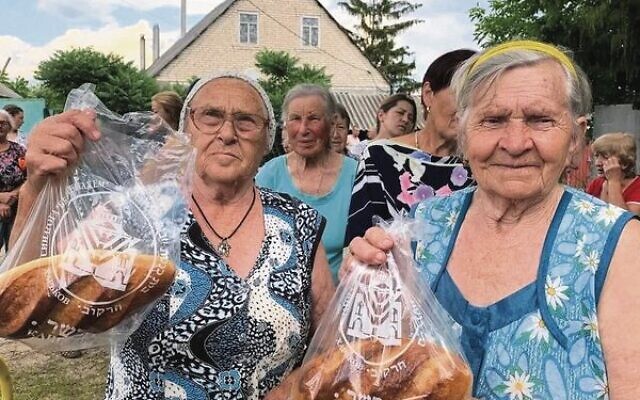 Handing out fresh bread in Kharkiv. Photo: Supplied.