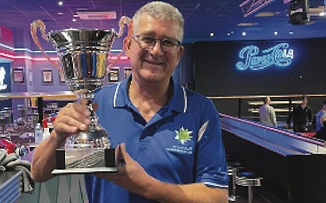 2022 Maccabi NSW Tenpin Bowling Club President's Cup winner Howard Silver with the trophy.