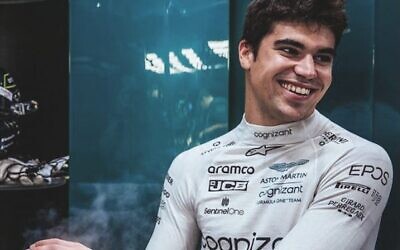 Lance Stroll smiling after his sixth place in Singapore.