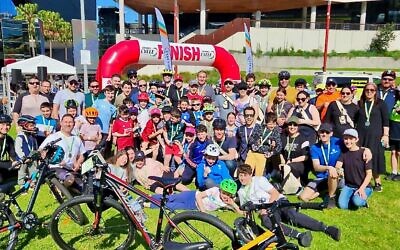Jewish residents from Sydney's north at the finish line of last Sunday's Spring Cycle event.