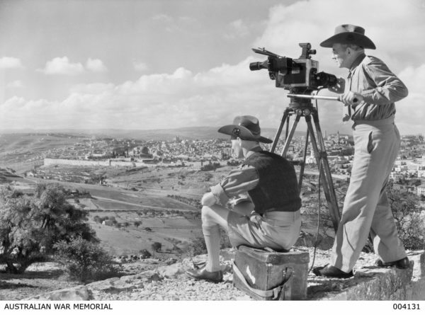Captain Frank Hurley (right) and Ron Williams working atop Mt Scopus overlooking Jerusalem on November 13, 1940. Photo: AWM, photo accession number 004131