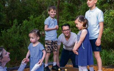 Asher Judah, his wife Mary and their four children taking time out in the Ashwood electorate. Photo: Quentin Jones