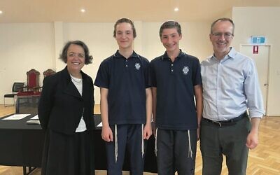 From Left: Miriam Munz, Benjamin Schwarz (winner), Shmuel Eisenberg (runner up) and their teacher Rabbi Ari Lobel.
