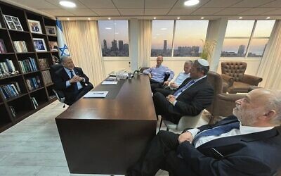 Benjamin Netanyahu (left) speaks to Otzma Yehudit leader Itamar Ben Gvir (second from right) for informal coalition talks at a Likud party office in Tel Aviv on November 7. 
Photo: Courtesy