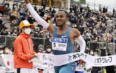 Israel's Maru Feferi crossing the finish line first in the 2022 Fukuoka Marathon in Japan on December 4.