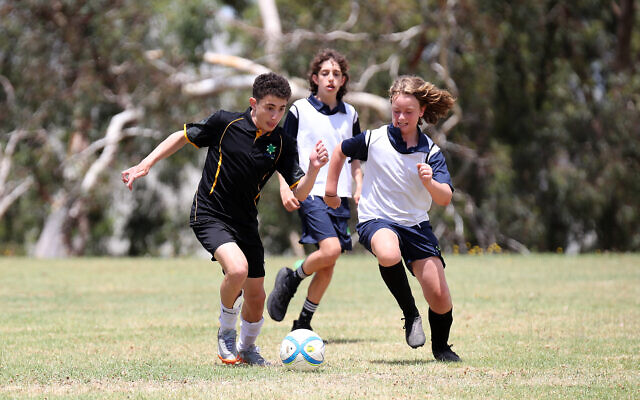 Kovi Leib from team WA (left) and Victorian Ezra Faigenbaum, challenge for the ball at the 2023 Maccabi Junior Carnival in Melbourne on January 16.  Photo: Peter Haskin