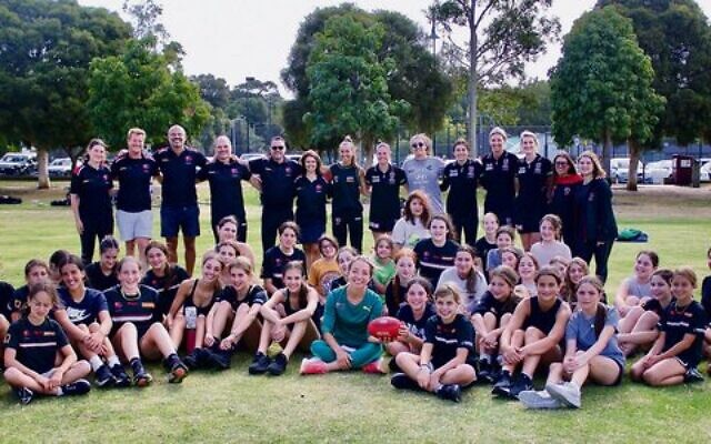Jemima Montag (front at centre) with participants, coaches, and some St Kilda AFLW players at last Sunday's AJAX girls' open day. Photo: AJAX
