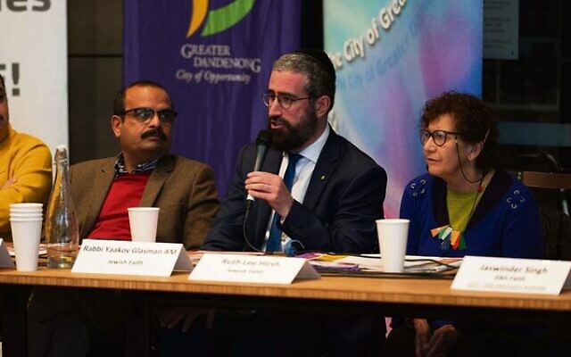 Rabbi Glasman (centre) speaking at the interfaith symposium.