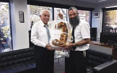 Harry Triguboff and Rabbi Dovid Slavin in 2016.