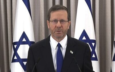 President Isaac Herzog delivers a message to the nation from his office in Jerusalem. Photo: Screenshot/Kan