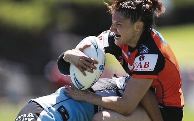 Ashleigh Werner on the charge for the Wests Tigers versus the Cronulla Sharks last Saturday. 
Photo: PureLight Photography