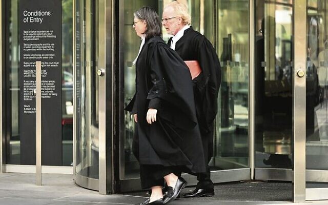 Crown prosecutors Stephanie Clancy and Justin Lewis outside the County Court of Victoria. 
Photo: AAP Image/James Ross
