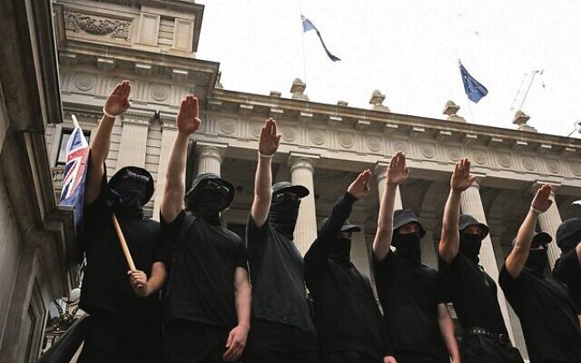 The neo-Nazi protesters outside Parliament House in Melbourne. 
Photo: AAP Image/James Ross