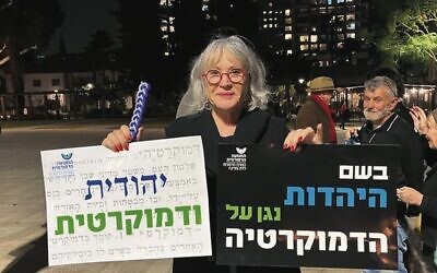 Lesley Sachs at a Saturday night post-havdalah protest in Israel.
