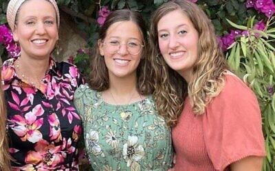 From left: Lucy Dee is seen with her daughters Rina and Maia. The two sisters were shot dead in a terrorist attack in the West Bank on April 7, 2023. Their mother, critically hurt in the attack, died on April 10, 2023. Photo: Courtesy