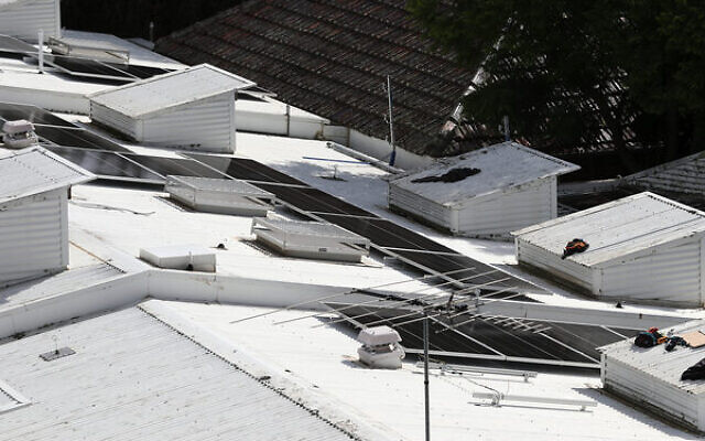New solar panels being installed at Beth Weizmann Community Centre. Photo: Peter Haskin
