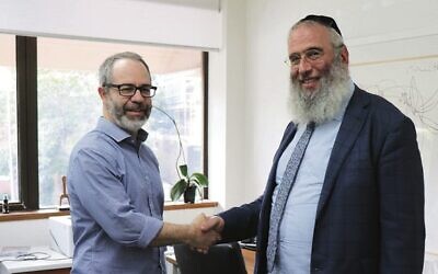 Errol Jacobson (left) with Jewish House CEO Rabbi Mendel Kastel.