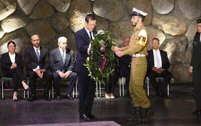 Israeli President Isaac Herzog prepares to lay a wreath at Yad Vashem. Photo: Yad Vashem