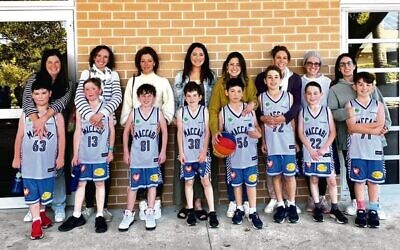 A Maccabi NSW Basketball Club boys' team with their mums at last year's Mothers Day round.