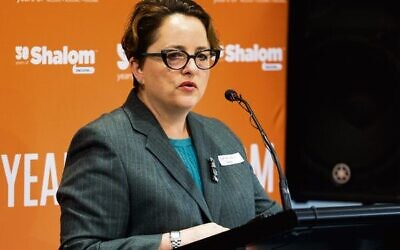 Justice Kelly Rees delivering the keynote address at Shalom's 50th anniversary event on March 29.
