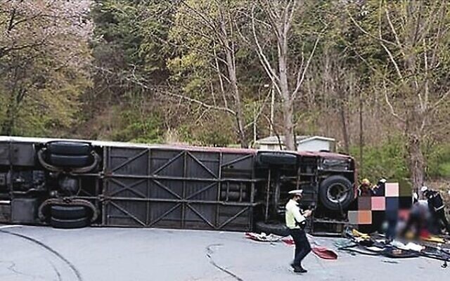 The overturned bus. Photo: Chungbuk Fire Service