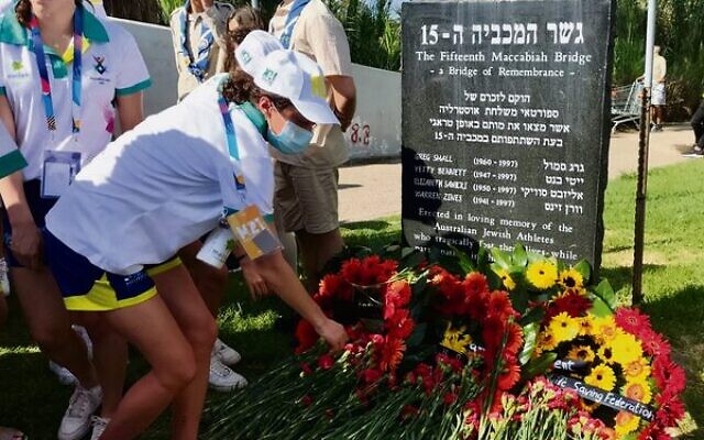 Aussies laying wreaths at a memorial for the 1997 Maccabiah Games bridge collapse disaster.