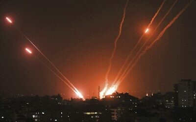 Rockets are fired from Gaza City towards Israel on May 13. Photo: Mahmud Hams / AFP
