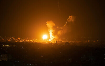 Fire and smoke rise following an Israeli airstrike in northern Gaza Strip, late May 2, 2023. Photo: AP Photo/Fatima Shbair