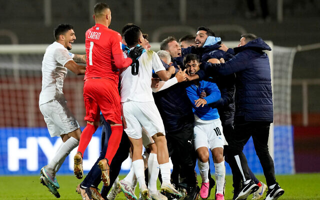 Israel's team celebrates winning 2-1 against Japan at the end of a FIFA U-20 World Cup Group C soccer match at the Malvinas Argentinas stadium in Mendoza, Argentina, May 27, 2023. Photo: AP Photo/Natacha Pisarenko