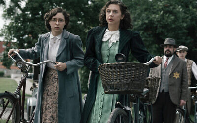 Margot Frank, played by Ashley Brooke, and Miep Gies, played by Bel Powley, arrive at a government checkpoint. Photo: National Geographic for Disney/Dusan Martincek