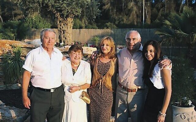 Carly (right) with her grandparents and parents at a family wedding in Israel.
