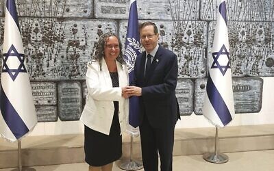 Rabbi Allison Conyer meets with Israel's President Isaac Herzog.