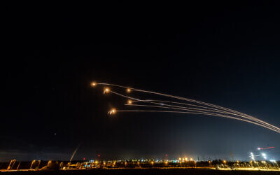 The Iron Dome anti-missile system fires interception missiles as rockets are fired from the Gaza Strip into Israel, as seen from Sderot, on May 13, 2023. Photo: Yonatan Sindel/Flash90