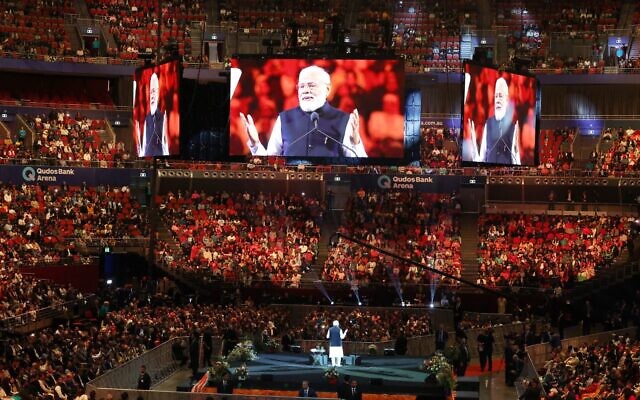 Indian Prime Minister Narendra Modi addresses the crowd at Qudos Bank Arena at Sydney's Olympic Park.