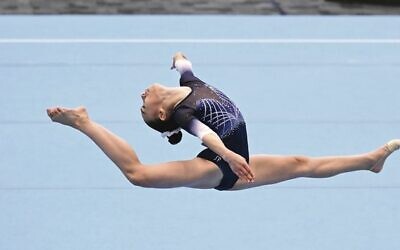 Jaimee Decent gets elegantly airborne in her floor routine at the 2023 nationals. Photo: Winkipop Media
