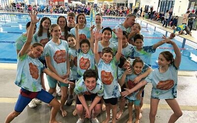 All together now! Maccabi NSW Swim Club's squad at last weekend's winter short course carnival in Orange. Photo: Elan Miller