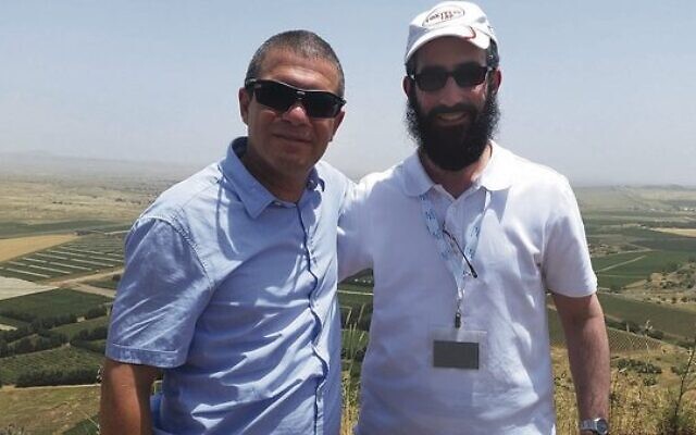 Rabbi Glasman (right) with Brigadier General Gal Hirsch on the Golan Heights.