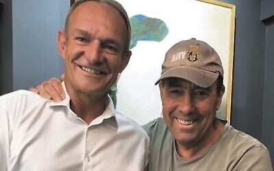 Gary Myers (right) meeting former South African rugby captain Francois Pienaar in Cape Town.