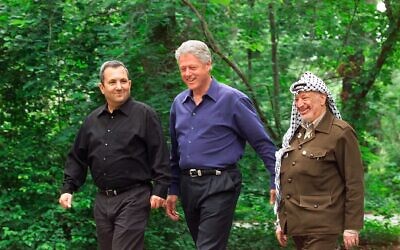 US President Bill Clinton (centre), Israeli Prime Minister Ehud Barak (left) and Palestinian leader Yasser Arafat at Camp David at the start of the Middle East summit on July 11, 2000. Photo: AP Photo/Ron Edmonds, File