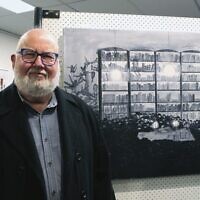 Harry Aizenberg at the exhibition launch, next to his painting 1939.